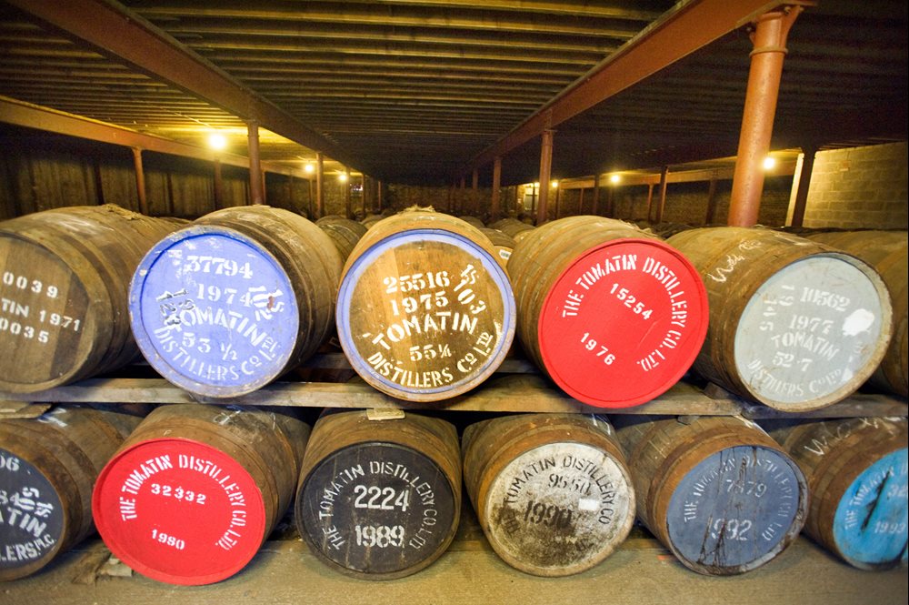 Barrels of Tomatin Malt Whiskey complete with dates of distilling lie in store at the Tomatin Distilllery, near Carrbridge, Invernesshire